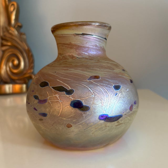 Marco Jarman iridescent art glass vase signed and dated 1978. Beautiful amber color with a mottled satin sheen overlay of...