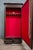Display Cabinet in Stained Wood – Red Upholstered Interior – 20th Century An elegant display cabinet in stained wood,...