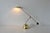 Modernist table lamp in the style of Bankamp Leuchten G from the 1980s. Made from solid brass and metal in a brass tone...