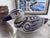 A charming hand-painted duck from Tonalá, Jalisco, Mexico. Cream-speckled clay is decorated with cobalt blue and warm...