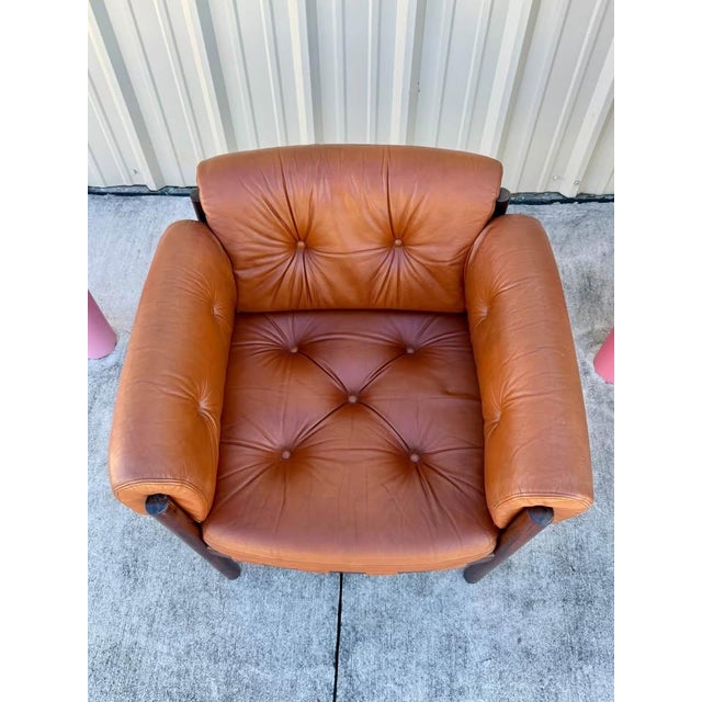 Offered is an exceptional and increasingly rare individual armchair, Attributed to Arne Norell for Coja, Sweden. This...