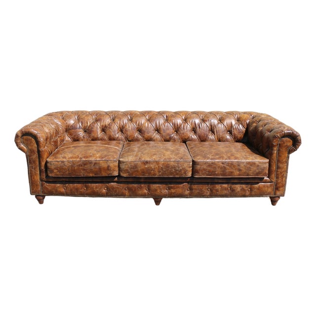 Industrial Distressed Brown Leather Chesterfield Sofa – Three Seat Tufted Sofa With Nailhead Trim & Casters For Sale