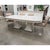 Book-matched geometric veneer and twin flared pedestals give the expandable surface a strong architectural presence....