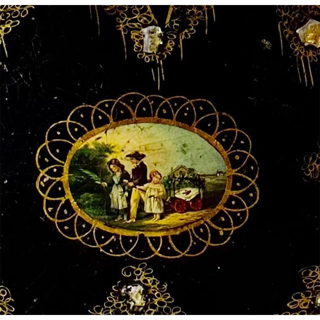 A very nice French papier-mâché tray with mother of pearl decoration and is also hand-painted in gold in the center with a...