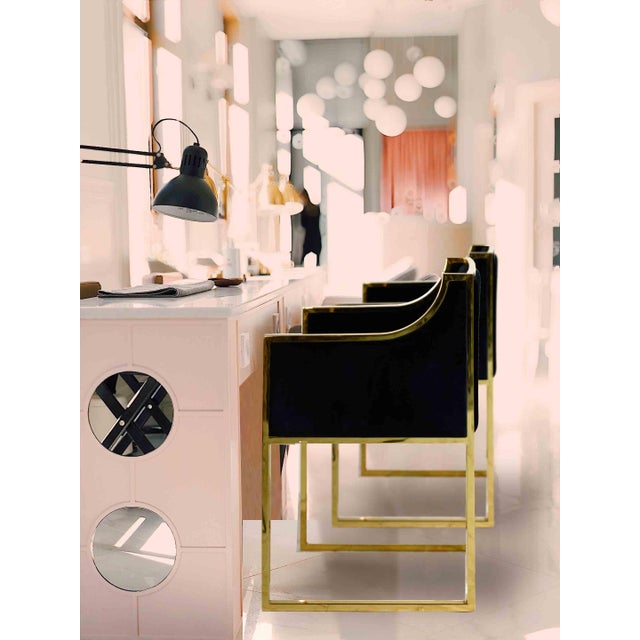 These stunning World's Away mid-century modern dining chairs ooze art deco style. Sweeping, curvilinear arms and polished...