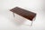 Architectural table from 1960’s with rosewood veneer top coated in epoxy. Table features black coated steel sculptural...