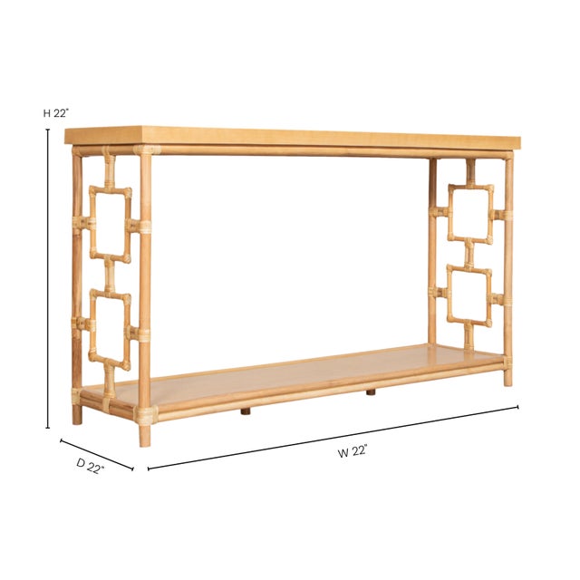 A modern take on classic rattan styling, this console table features a rattan frame with leather bindings and a wooden...