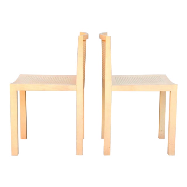 Pair of minimalistic beechwood side chairs.
