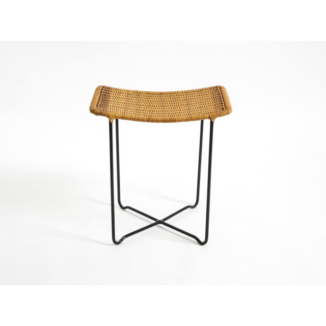 Rare, original Mid-Century Modern rattan stool in very good vintage condition. Fantastic 1950s design. Made in Germany. It...