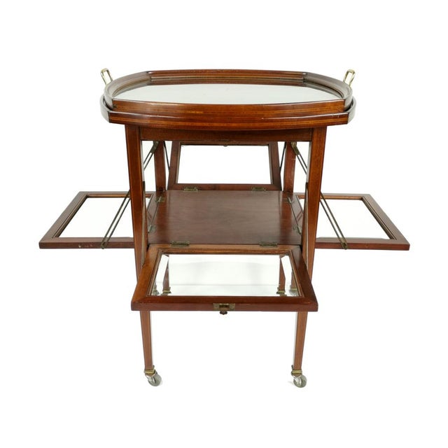 A truly charming and unique French bar cart from around the 1930s, crafted from warm, rich mahogany. It’s a wonderful...