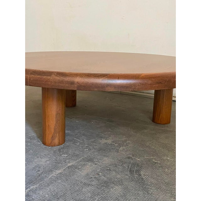 This monumental table introduces commanding architectural presence and rich organic texture into an interior. Crafted in...