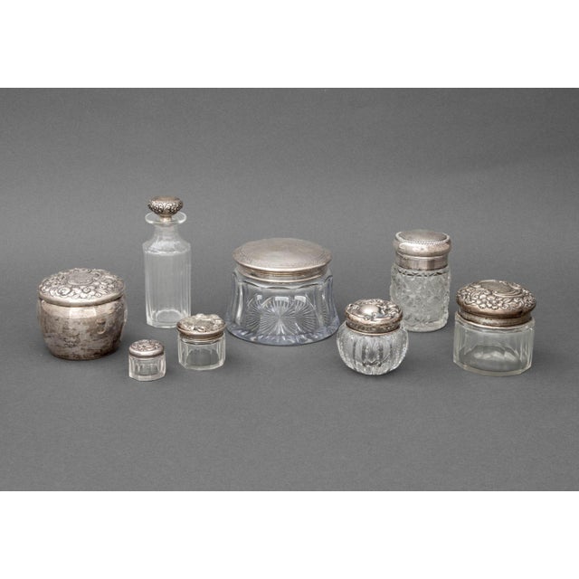 Collection of Eight Sterling Silver and Cut Glass Vanity Accessories, comprising: a Alvin Sterling jar, struck with marks...