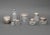 Collection of Eight Sterling Silver and Cut Glass Vanity Accessories, comprising: a Alvin Sterling jar, struck with marks...