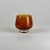 A stunning vintage hand blown small round art glass vase in amber color with a white swirling stripe. It is illegibly...