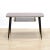 This mid-century atomic side table was designed and manufactured in England during the 1960s. With a fantastic mix of wood...