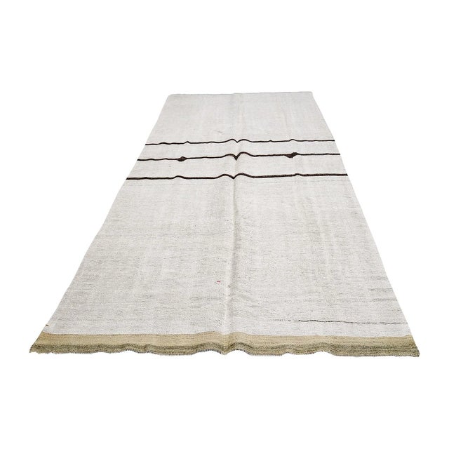 Handwoven vintage hemp kilim rug from Yozgat region of Turkey. Approximately 45-55 years old. In very good condition.