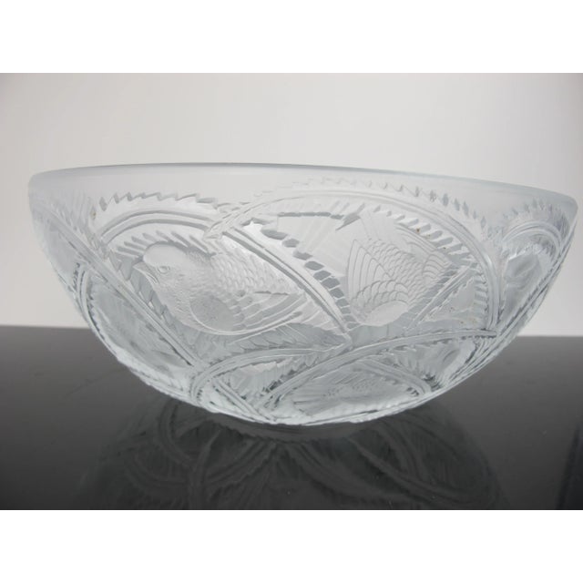 Stunning Lalique France crystal bowl showing scrolling leaves and birds. Measures 9.5" wide x 3.75 tall. Etched hallmarks...