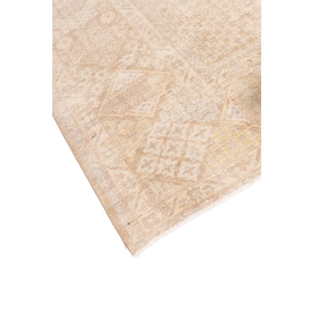 A finely hand-woven Antique Joshegan rug, distinguished by its elegant geometric design and rich natural dyes. This rug is...