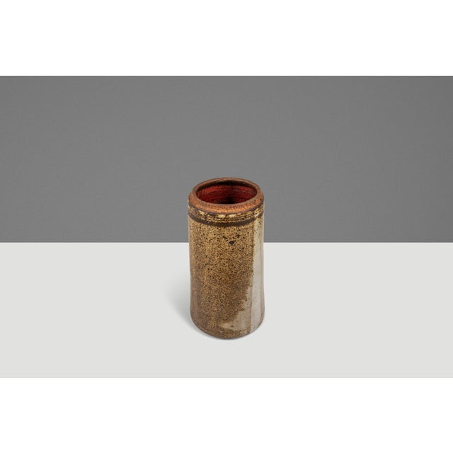 Introducing a stunning Japanese Modern stoneware vase. Simultaneously understated and intricate this studio pottery piece...