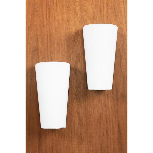 Pair of glashutte limburg wall lamps with chrome frame and frosted glass. In good vintage condition. Measurements h. 22...