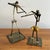 Jazzy metal pair of brutalist instrumentalists, playing a violin and a flute. Most items found at Pub & Oasis are vintage...
