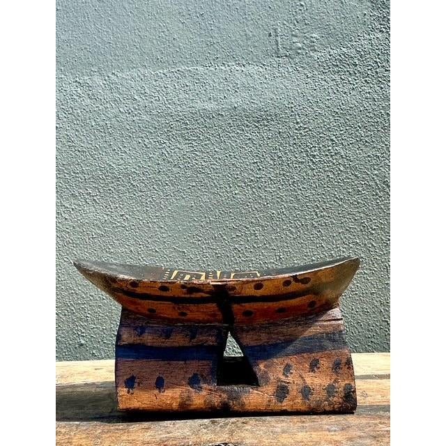This exceptional vintage Brazilian headrest is a masterclass in indigenous folk art and sculptural form. Hand-carved from...