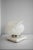 Murano glass table lamp from the 1980s, made in Italy. The lamp is made of hand-blown Murano glass with a structured shape...