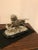Stunning French polished nickel bronze sculpture of ferocious lion standing on alligator signed E Delabrierre. Sitting on...
