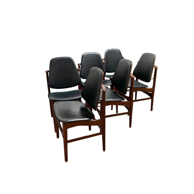 Wonderful vintage set of 6 mid century modern Danish dining chairs attributed to Arne Hovmand Olsen. The frames are made...