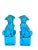 Pair larger size Chinese foo dogs. The bright turquoise blue is perfect for a pop of color. Sourced in France.