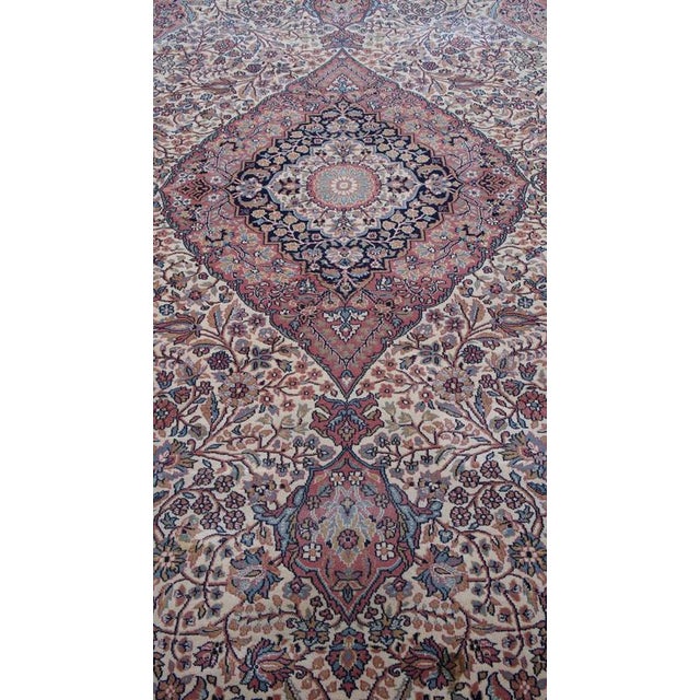 Offered is this oriental style rug including pink and blue colors 302x208cm. Let your home shine with this beautiful rug....