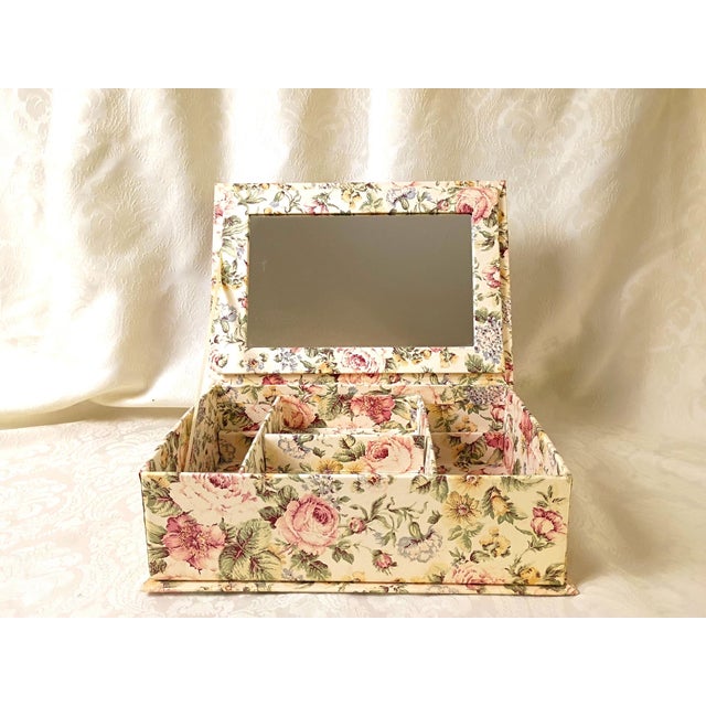 This fabric-covered jewelry box with mirror handcrafted by We've Got You Covered in Gardena, California, brings...