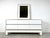 Mid century 6 drawer credenza by Alain Delon in white lacquer and brass. This exquisite credenza is pure quality, with a...