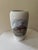 A stunning example of Royal Copenhagen’s celebrated naturalistic porcelain painting, this elegant vase wraps a fully...