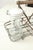 1920's French bottle carrier with eight sections. Formerly used to transport milk, includes glass milk bottle. We're...