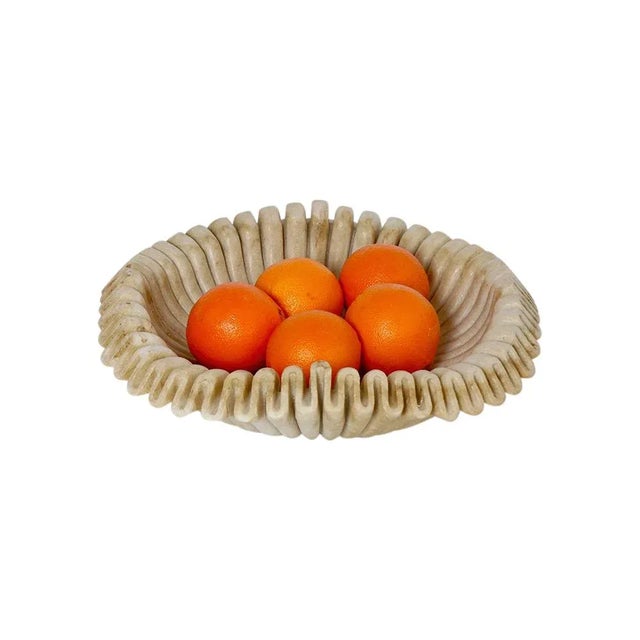 This marble bowl is equally at home on the dinner table or in an art gallery. Featuring handmade folds, it can be placed...