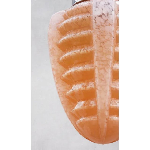 French Art Deco 'Machine Age' Clichy Glass Pendant Light C1930. Glossy stepped peach pink mottled glass shade with new...