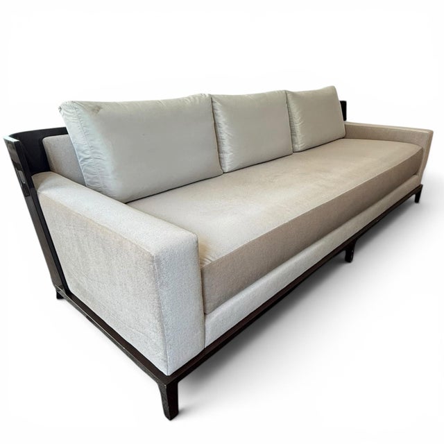 Elegant sofa by Christian Liaigre for Holly Hunt. The Aspre sofa has a striking frame made of luxurious macassar ebony...