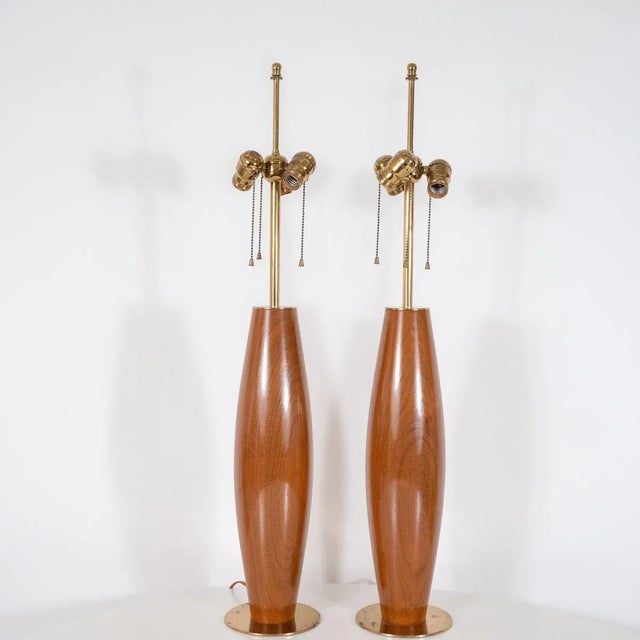 Pair of walnut table lamps with brass hardware by Stewart Ross James for Hansen. Creator: Stewart Ross James Manufacturer:...