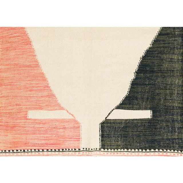 Artistic handwoven wool rug showcasing abstract shapes in Rust Brown, Coral Pink, Coral Red, Dark Olive Green, and...