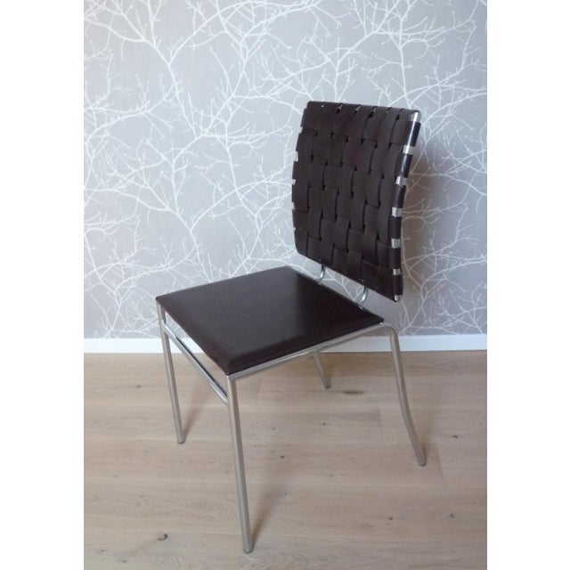 Dining room chair in genuine leather, woven for the back, in sewn wafer for the seat Dark brown color Condition: new