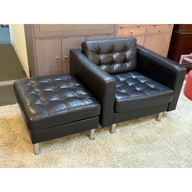 Design Plus Gallery presents a Tufted Club Chair + Ottoman with Black Vegan Leather. This silhouette has mid-century...