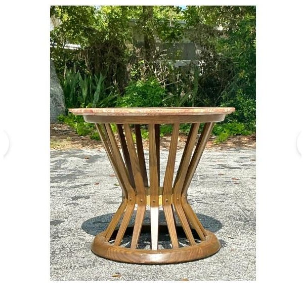 Presenting a truly iconic piece of American design: this Vintage Edward Wormley for Dunbar Stone Top Side Table. A...