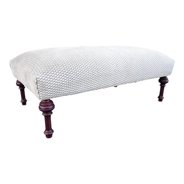 Late 20th Century Traditional Style Ottoman With Turned Legs Newly Upholstered in Pollack For Sale