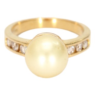 18k Yellow Gold Ring With a Yellow Pearl & Channel Set Diamond Accents - 6.25 For Sale