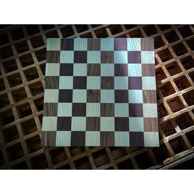 A solid hardwood chess board built for both play and display. Crafted from Ash and Walnut, each board is finished to...
