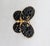 Rare 1960s goldtone 4 oval carved faux-onyx in the shape of a butterfly brooch. Marked "NAPIER" on the back. Measures: 1...