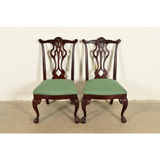 An outstanding pair of Chippendale or Georgian style side chairs or dining chairs By Thomasville USA, Circa 1980s Carved...
