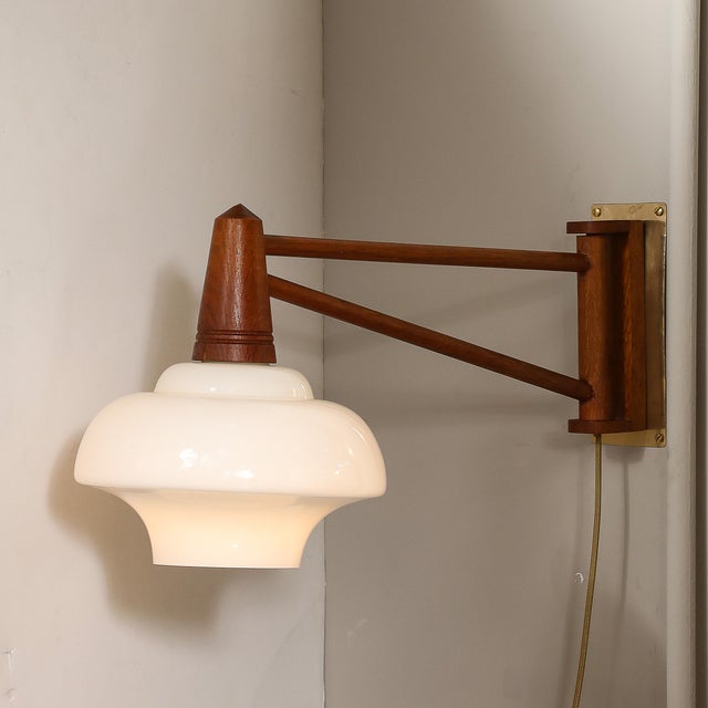 Mid-Century Modernist Milk Glass & Teak Swing Arm Wall Sconce W/ Brass Fittings For Sale In New York - Image 6 of 12