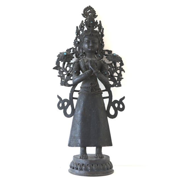 Antique 19th Century Bronze Tibetan Bodhisattva. Signed on the back (please see last pic). The flowers have blue stones.